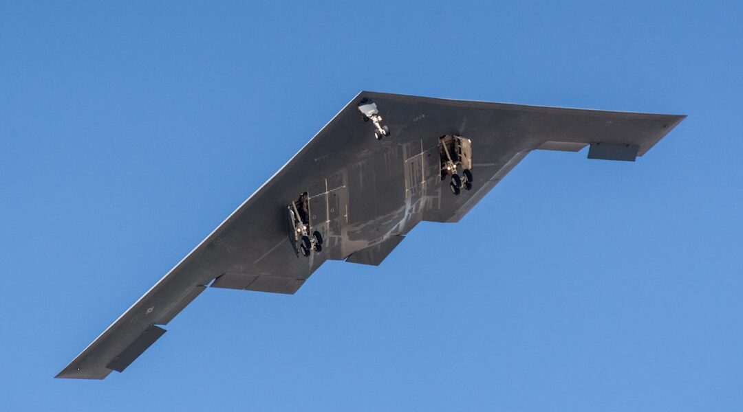 B-2 Spirit stealth bomber in flight with landing gear extended